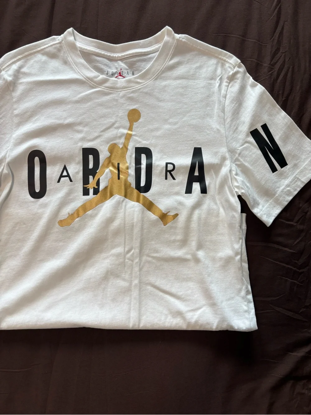 Jordan White Short-Sleeve Tee with Gold Jumpman and Black Lettering
